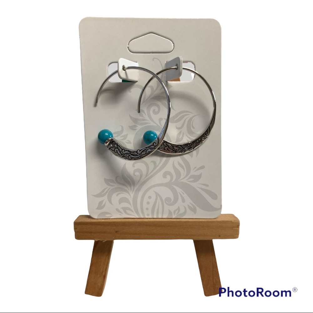 Detailed hanging earrings